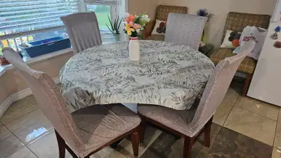 Round table wood dining set with 4 white cushion chairs, View more