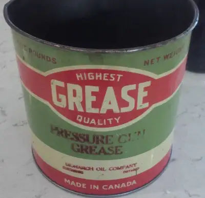Tin is a 5 pound size with wording saying Highest Grease Quality, Monarch Oil Company, Kitchener, ON...