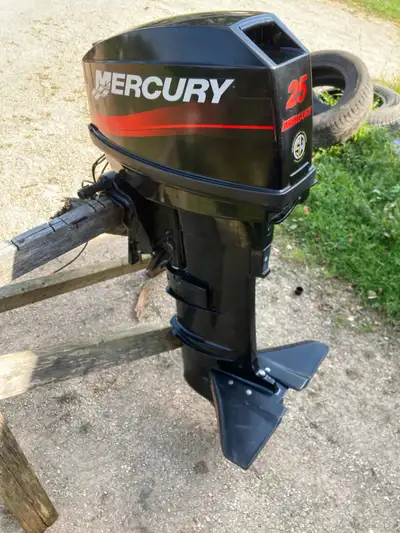 2003 Mercury 25hp long shaft. Electric start and charging system. Comes with all controls needed. Mo...
