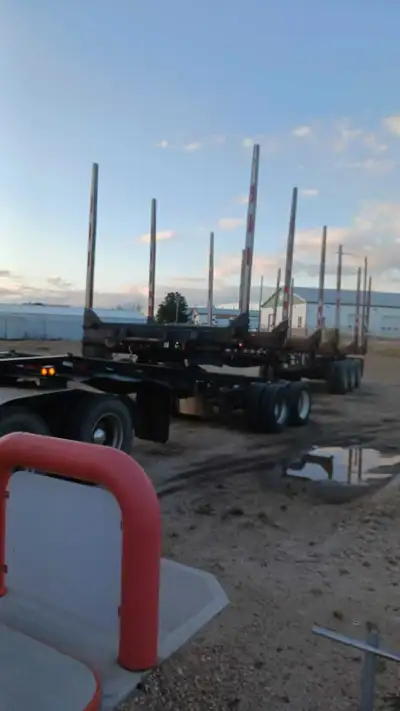 I'm selling a 2017 Peak hayrack tridem axle log trailer, which is 51 feet in length and equipped wit...
