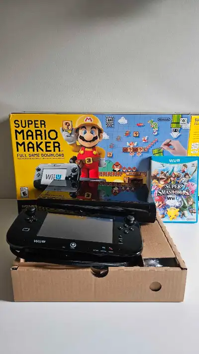 Works perfectly in very good condition with some scratches on the console. Super Mario Maker is down...
