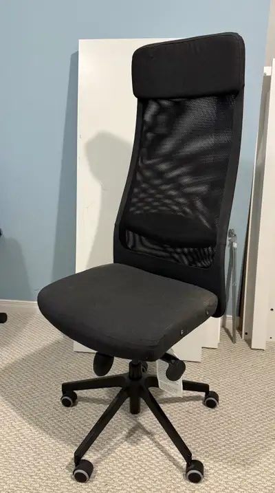 Selling IKEA Markus fabric office chair in good condition. No holes or damage. Armrests included (cu...