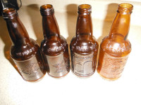 4 Vintage Sioux City Embossed Amber Glass Bottles