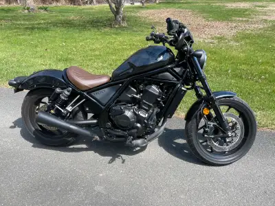 For Sale: used Honda Rebel (CMX) 1100. It has 9500 kms and includes an extra seat and handlebar rise...