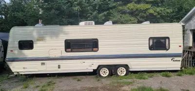 Good frame, walls and doors are rotted. Selling for parts. Stove $200, 21.5"w, 20"d, 16.5"h. Microwa...