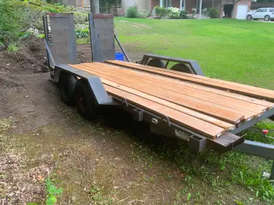 16 foot heavy duty trailer, super strong ramps for heavy equipment, comes with 6 brand new tires on...