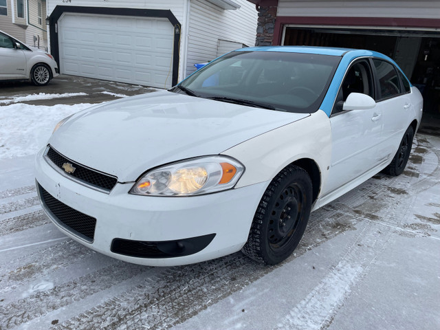 2011 Impala two sets of tires in Cars & Trucks in Red Deer - Image 4