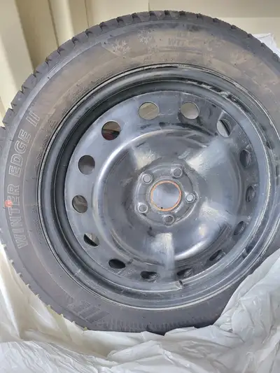 4 x. 215 50R17 9H. CDN TIRE. "WINTER EDGE 11" ONLY USED ONE SEASON. LESS THAN 1,000 KL BOLT PATTERN...
