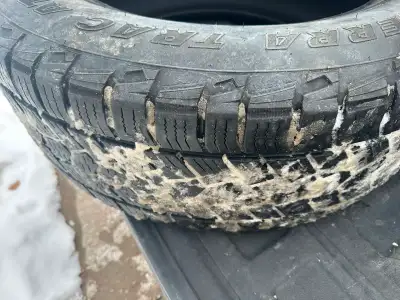 2 x A/T 275-60-R20 Tires with over 50% tread and they are winter rated…