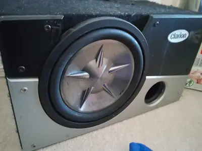 EXC BASS, EXC CONDITION, 10" CLARION SUBWOOFER IN FACTORY MATCHING CARPETED ENCLOSURE, GOLD INPUT PL...