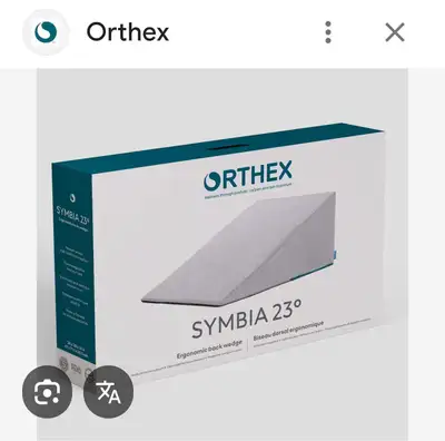 New, open Box, but never used. Symbia 23° Ergonomic back wedge Medium incline support Dimensions and...
