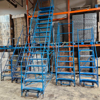 Different Sizes Rolling Stair Ladders w/ Saftey Lock for sale.  