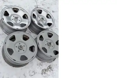 4 17" 5 x 120mm Steel rims. Off of an Acura but will fit some BMW and GM models. 8 1/2" Overall widt...