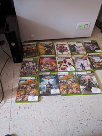 Xbox 360 avec 14 jeux et 28 dans la console
