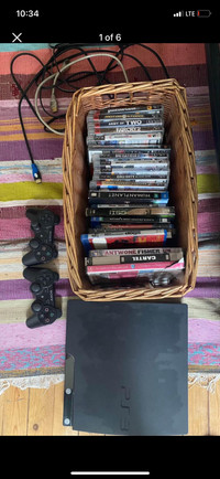 PlayStation 3 with 2 Controllers, All Cords, 10 Games, 13 DvDs 