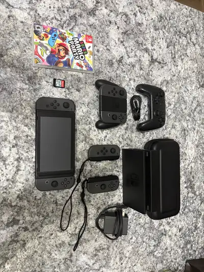 	Nintendo Switch Bundle w/ 6 Joy-Cons + Extras, View more