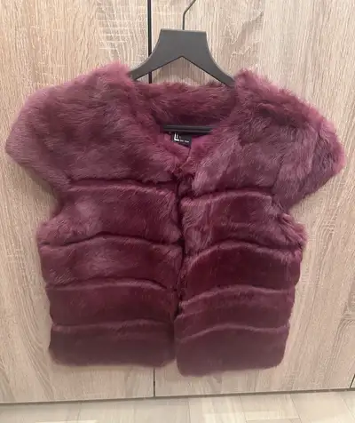 Lovely Vest by Love Token with shoulder detail. Size small. Never worn. Makes a nice gift. Smoke fre...