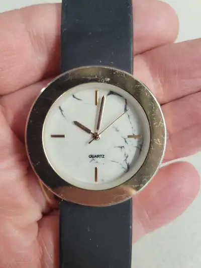 Ladies copper color and marble dial watch. A really looker., View more