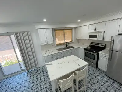 3 bedroom main floor apartment