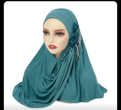 3 pieces for $25 This elegant Hijab, adorned with delicate floral accents and shimmering rhinestones...