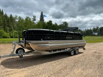 2022 Berkshire fishing pontoon boat. Live well. Tackle box locker. Rod locker, rod holders, flip up...