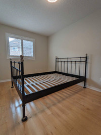 Black metal queen-size bed frame for free