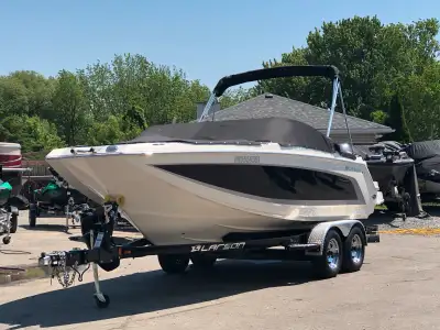 Larson bowrider, beautiful black on white all fiberglas boat (no wood) Immaculately maintained, with...