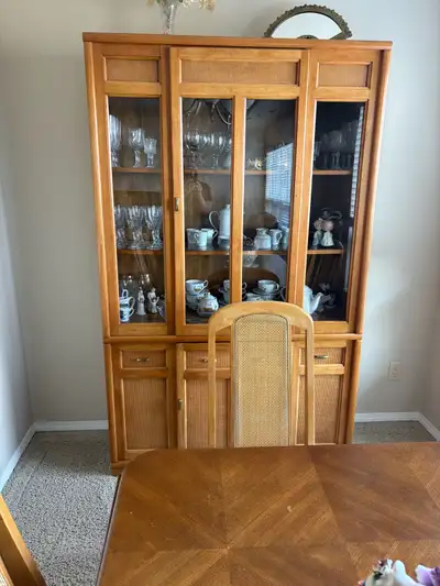 6 chairs, table(nothing on th table) and empty china cabinet.