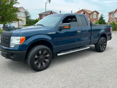 2014 Ford F150, XTR 4 x 4 5.0 L coyote extended cab four-door 6 1/2 foot box with bedliner loaded XM...