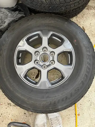 Brand new bronco rim and tire Got new rims and tires 275/75 R17