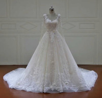 Magnifique robe de mariée haute gamme sur commande acheteur séri