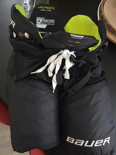 Bauer Hockey Skates and Pants with CCM Shoulder Pads, View more