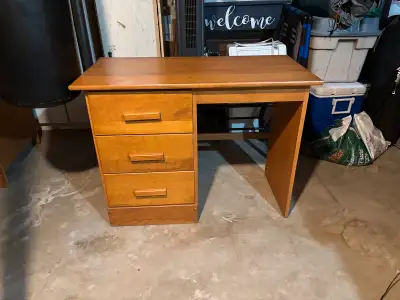 Desk in good used condition with three drawers. 40” long by 20” wide x 29 3/4” high. Smoke free, pet...
