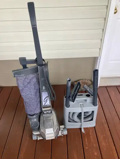 This pre-owned Kirby G6 vacuum cleaner, complete with an assortment of helpful attachments, is ready...