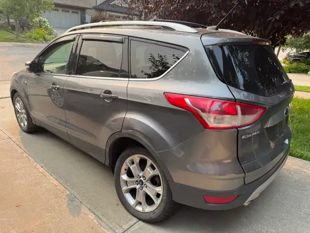 2014 Ford Escape Titanium **Rear left damage**