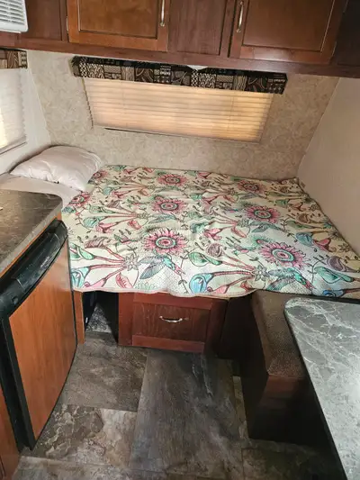 25000 obo 16.6 foot pull trailer Perfect for 2 Very comfortable bed 54"x 81" Hot water tank Furnace...