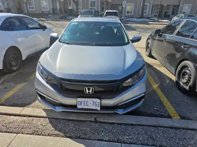 I'm selling my 2020 Honda Civic LX, a reliable and efficient sedan with 99,500 kilometers. This silv...
