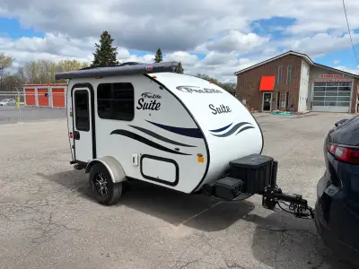 This is a super-light mini 2-person camping trailer made by Prolite in Quebec. It is like a teardrop...