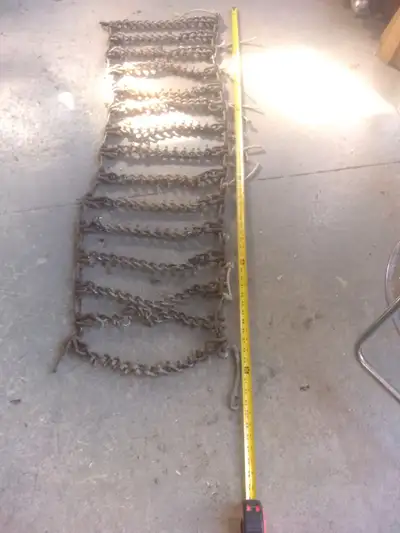 Teethed Tractor Chains, I had them on a Kubota BX26