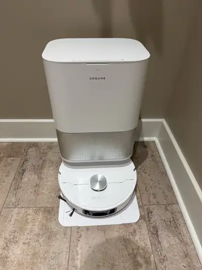 I'm selling my Dreame Robot Vacuum and Mop with Auto-Empty Station. Has LiDAR navigation and a side...