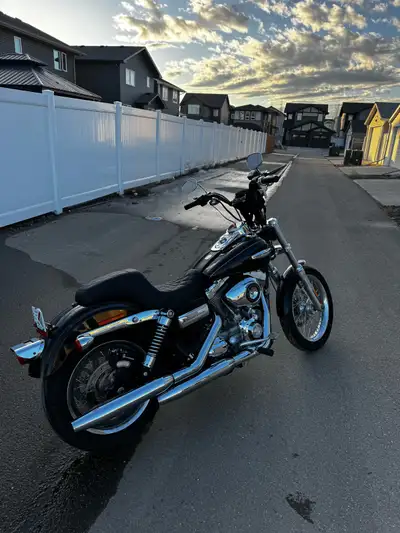 Selling a 2009 Harley Davidson Dyna Super Glide Custom would trade or sell. This bike is in good sha...
