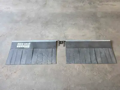 Rock Solid Tow Guard Attaches to the Tow hitch to protect your trailer from rock damage Used once.