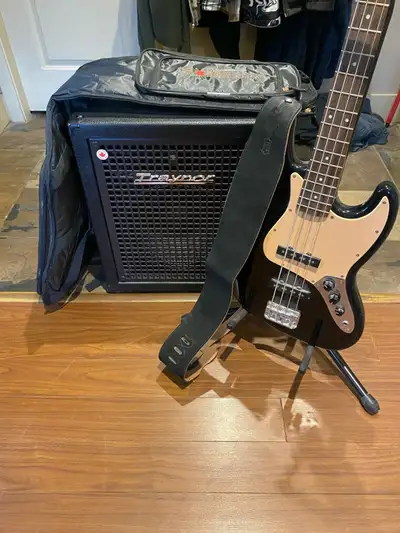 Traynor 400w bass amp Fender Squire and Levi strap with crossrock deluxe gig bag. Guitar stand not i...
