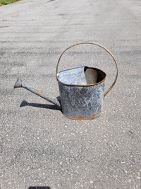 antique steel watering can