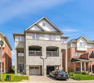 Welcome to this beautifully designed freehold semi-detached home (approx. 2,077 sq ft) offering spac...
