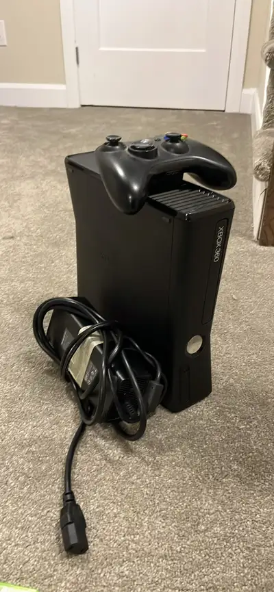 Xbox 360 Slim + games , View more
