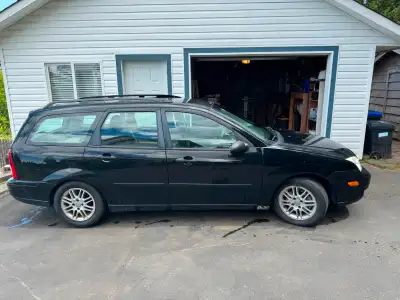 Good condition wagon (given its age), with a few rust spots. New all season tires, and a set of wint...