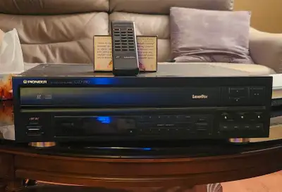 I HAVE A PIONEER LASERDISC PLAYER CLD-990 WITH REMOTE-NTSC -01-BIT DLC..MADE IN JAPAN..WORKS GREAT.....