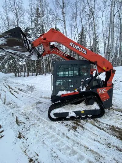 I am selling a Kubota SVL65-2 2019 compact track loader, known for its robust performance and reliab...