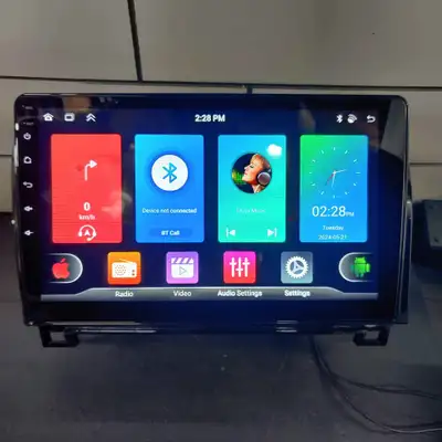 High definition and bright 10.1" touchscreen with wireless Carplay! ALL wires, cables, rear reverse...